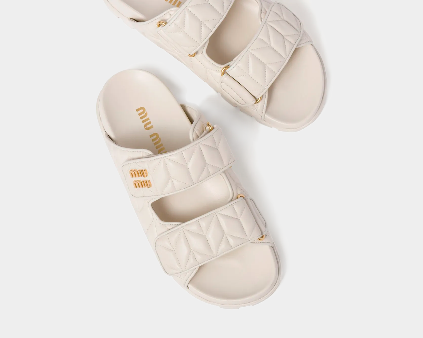 Slide Miumiu Matelassê em couro nappa