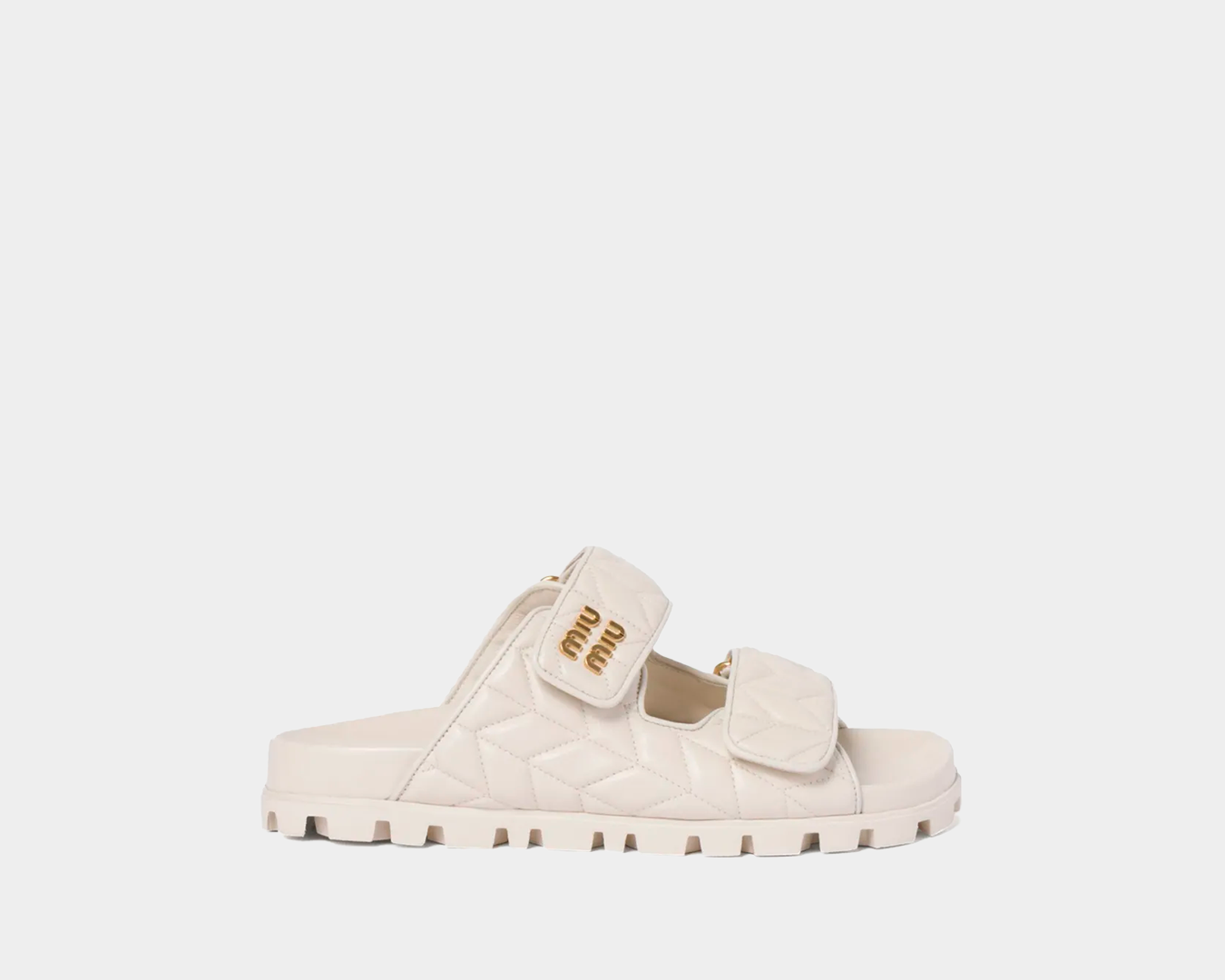 Slide Miumiu Matelassê em couro nappa